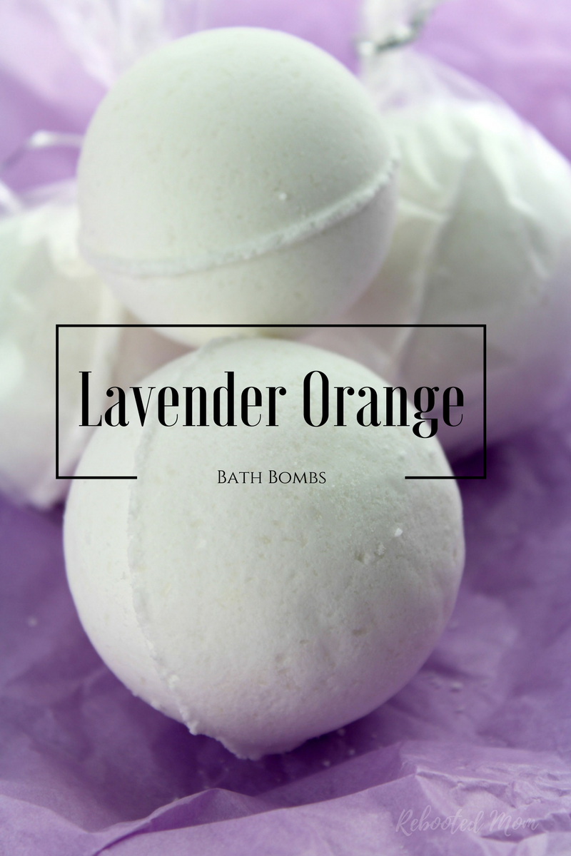 These Lavender Orange Bath Bombs smell like popsicles and are easy to make at home with a few, simple ingredients! Learn how to make your own Lavender Orange Bath Bombs with this easy DIY!