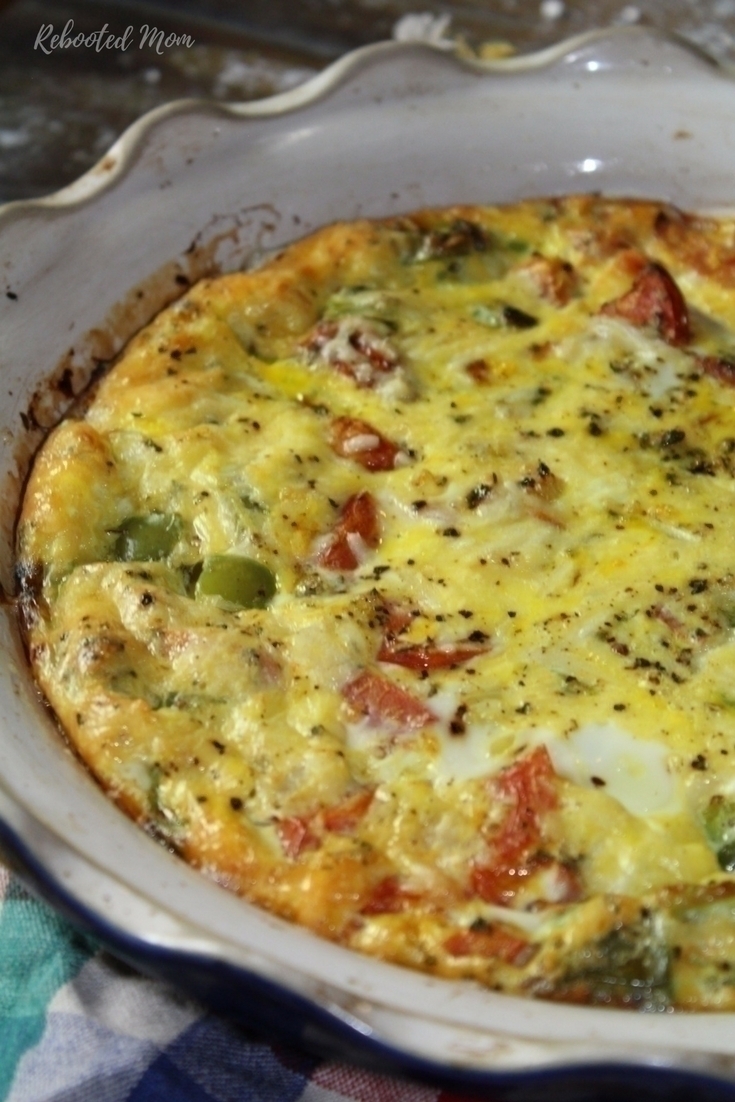 Roasted tomatoes and green bell peppers dressed with seasonings and cheese and baked up in this wonderful meatless breakfast casserole.
