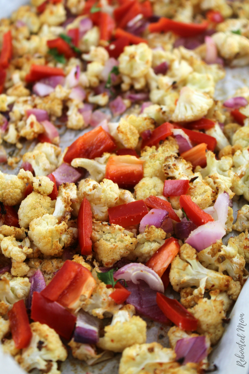 Cauliflower and red onions are tossed in a blend of chipotle sauce, honey, lime juice and garlic before being roasted. Serve with fresh cheese, sliced red bell peppers, cilantro, green onions, and sour cream or additional hot sauce.