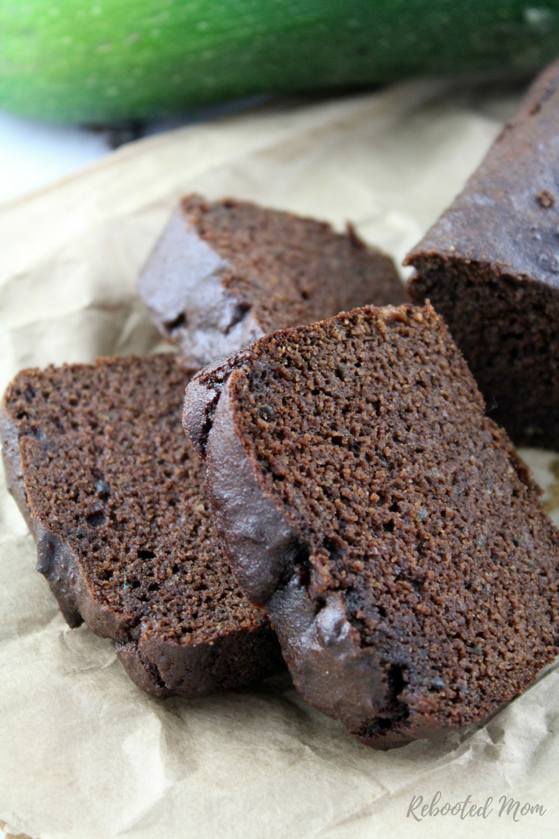 Moist and delicious paleo chocolate zucchini bread with simple ingredients, sweetened with maple syrup.