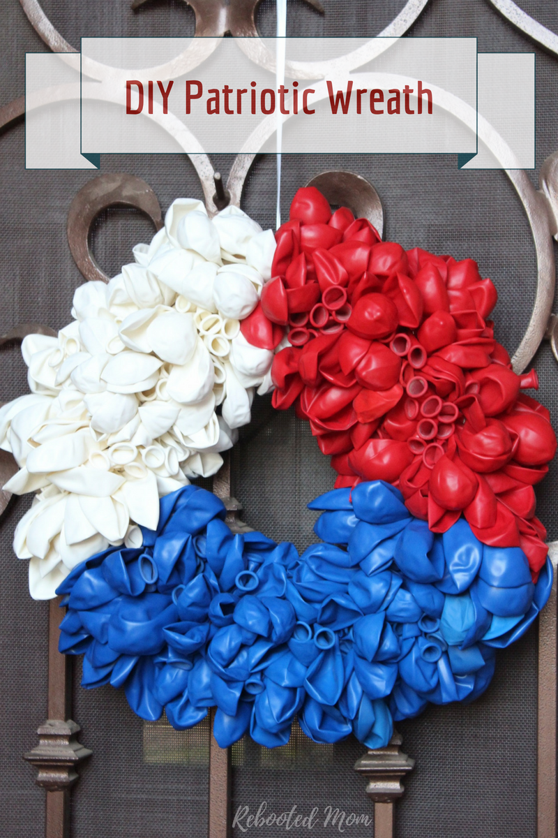 This DIY Patriotic Balloon Wreath is SUPER cute and perfect for July 4th, Labor Day or even Memorial Day!  It's a fun and easy craft that the kids can help you accomplish.
