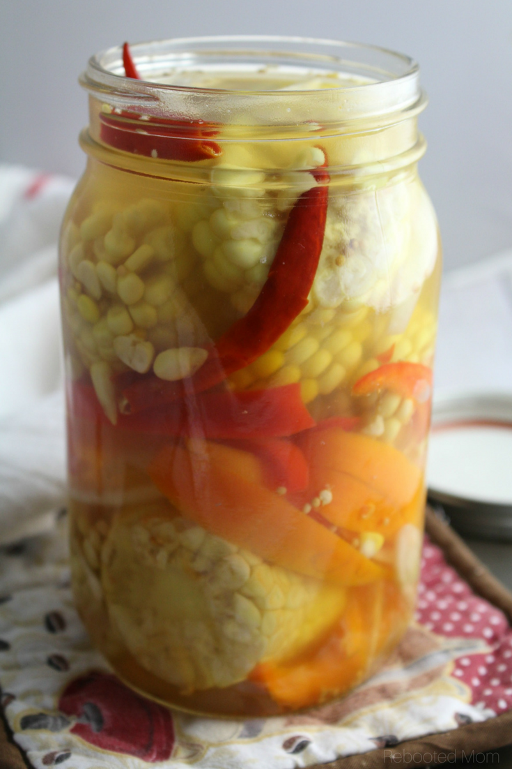 A flavorful way to enjoy your summer bounty - pickled corn and peppers is incredibly simple and wonderfully refreshing on a hot day!