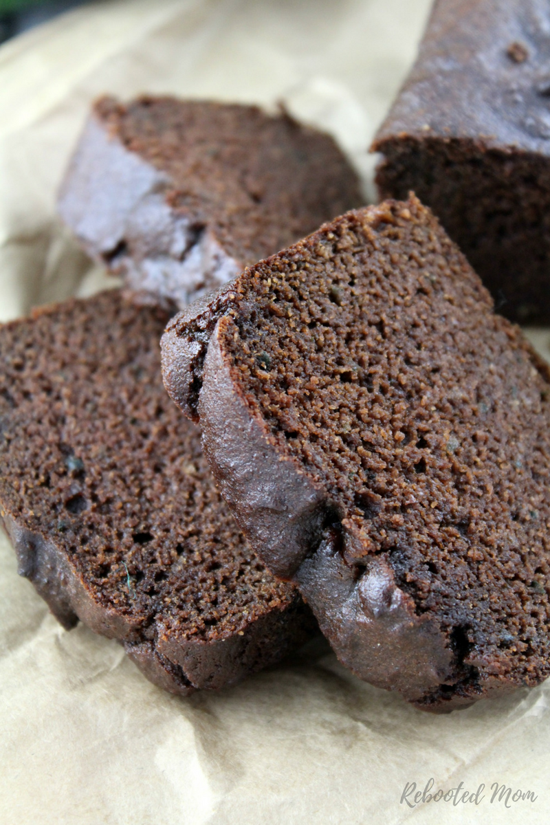 Moist and delicious paleo chocolate zucchini bread with simple ingredients, sweetened with maple syrup.
