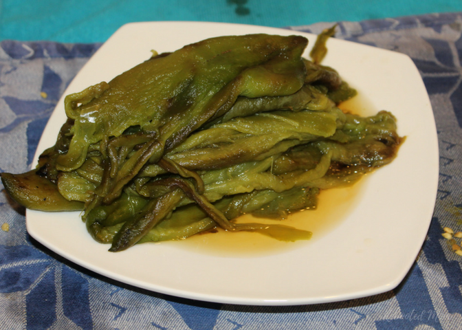 Cool fall weather brings Hatch Green Chiles! Find out how to roast green chiles so you can cook with them all year long!