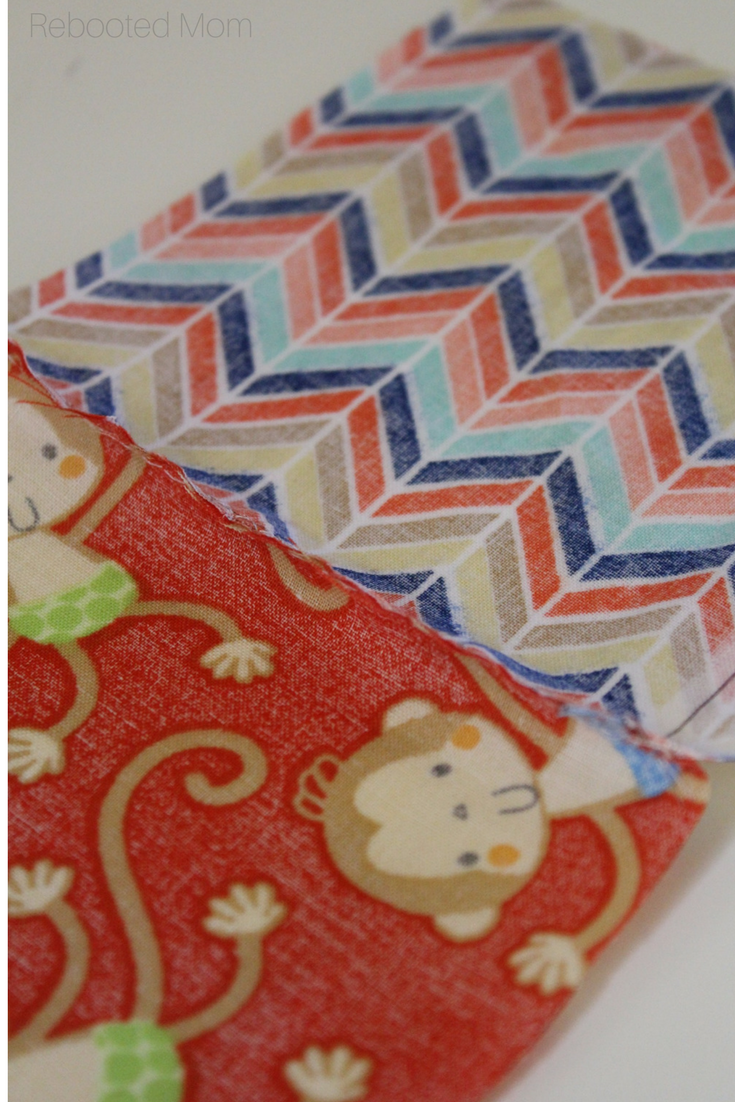 These soft rattle baby blocks are a great way to use fabric scraps and are super easy to sew, even for a beginner! #baby #sewing