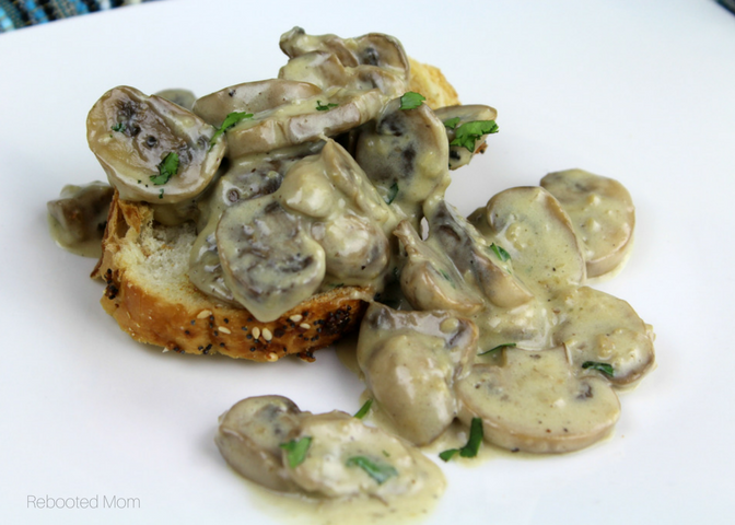 Easy, creamy mushrooms that are warm, comforting and delicious when served atop rice, on toasted garlic bread, or as a side - ready in just minutes! #mushrooms #sidedish #meatless