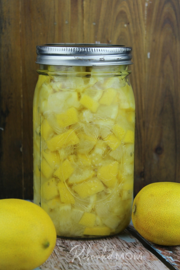 With just a few simple ingredients, throw together these preserved lemons to dress up your favorite dish - whether seafood, rice & more.   #lemons #lemonrecipes #preservedlemons #preserve #healthy #condiments