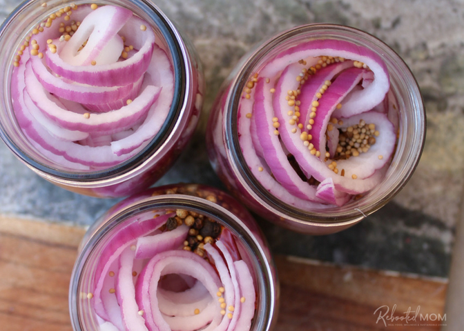 Learn how to make the best quick-pickled red onions, with a flavorful brine that can be easily adapted to suit your taste! These pickled red onions compliment any meal!