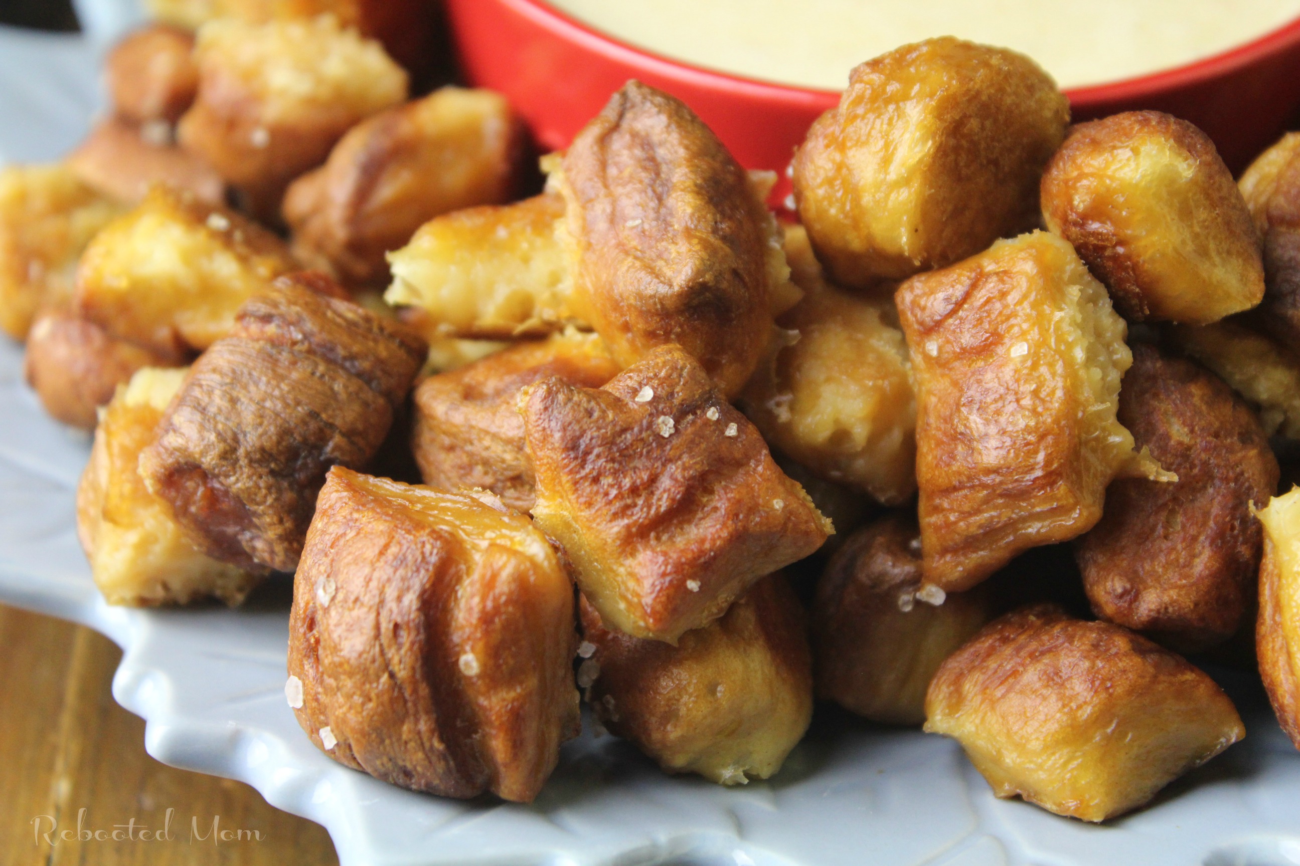 These yummy pretzel bites are simple to whip up and delicious when served as an appetizer or snack. You won't believe how easy they are to make at home!
