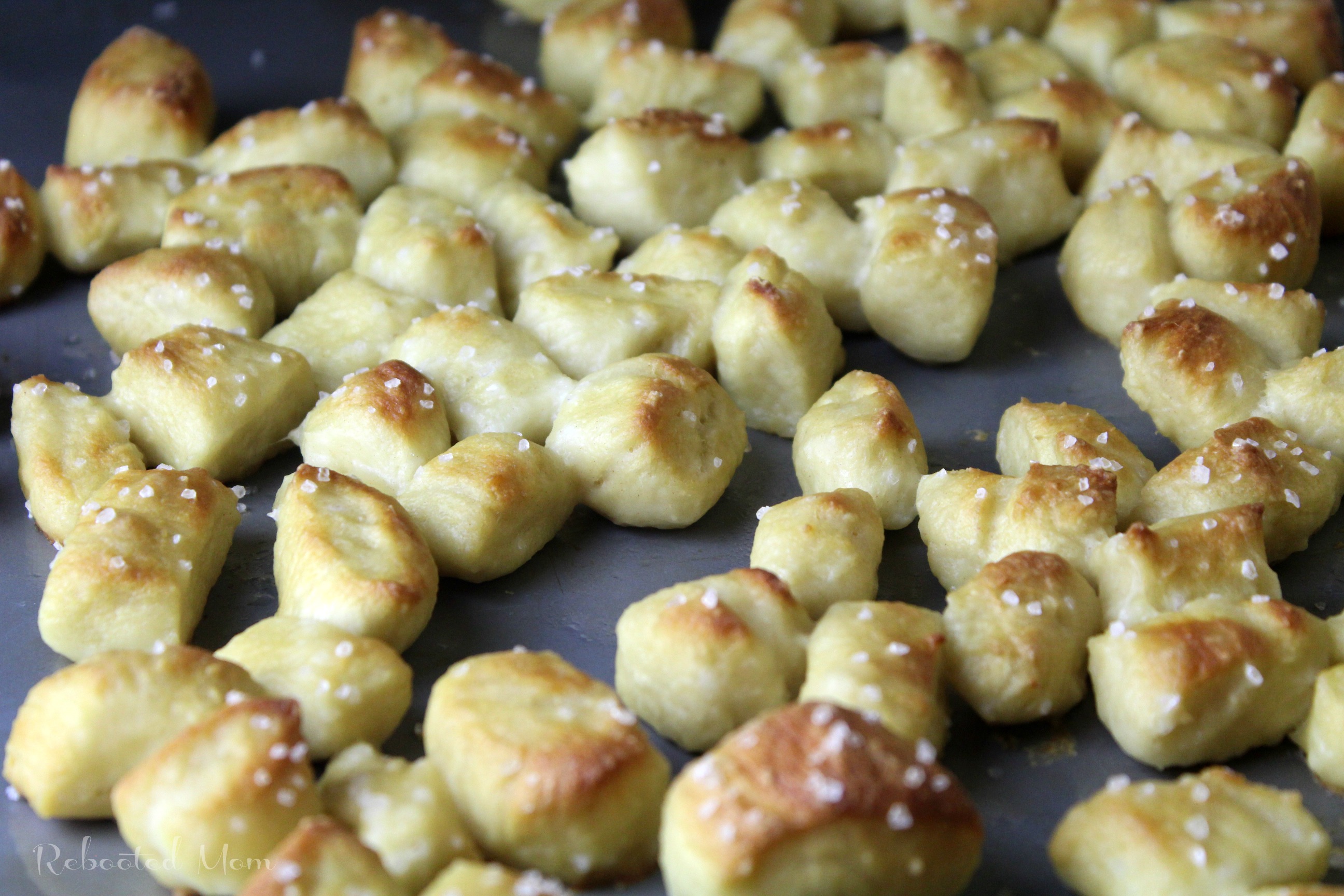 These yummy pretzel bites are simple to whip up and delicious when served as an appetizer or snack. You won't believe how easy they are to make at home!