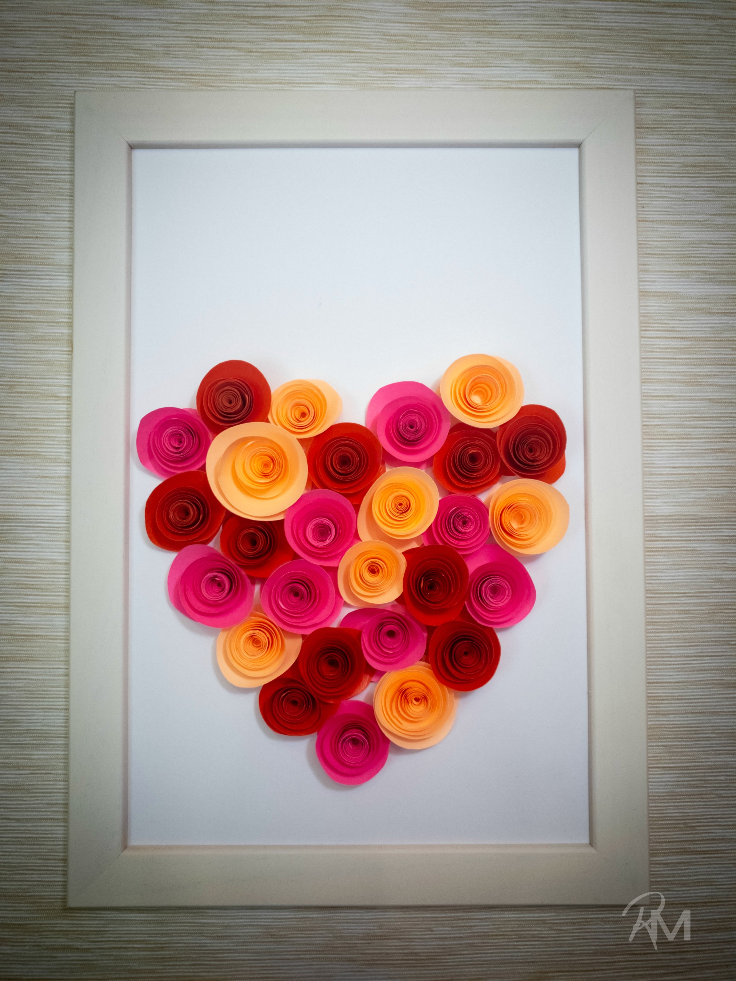 It's all about hearts and roses with this easy Paper Heart Rose Craft, which is a wonderful way to help kids develop patience and fine motor skills.