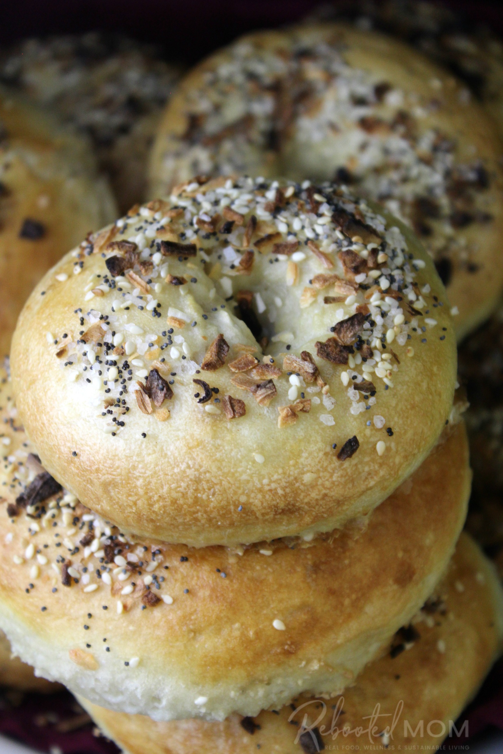 Easy homemade sourdough bagels you can make at home with your own active sourdough starter. This step by step tutorial makes the most delicious bagels!