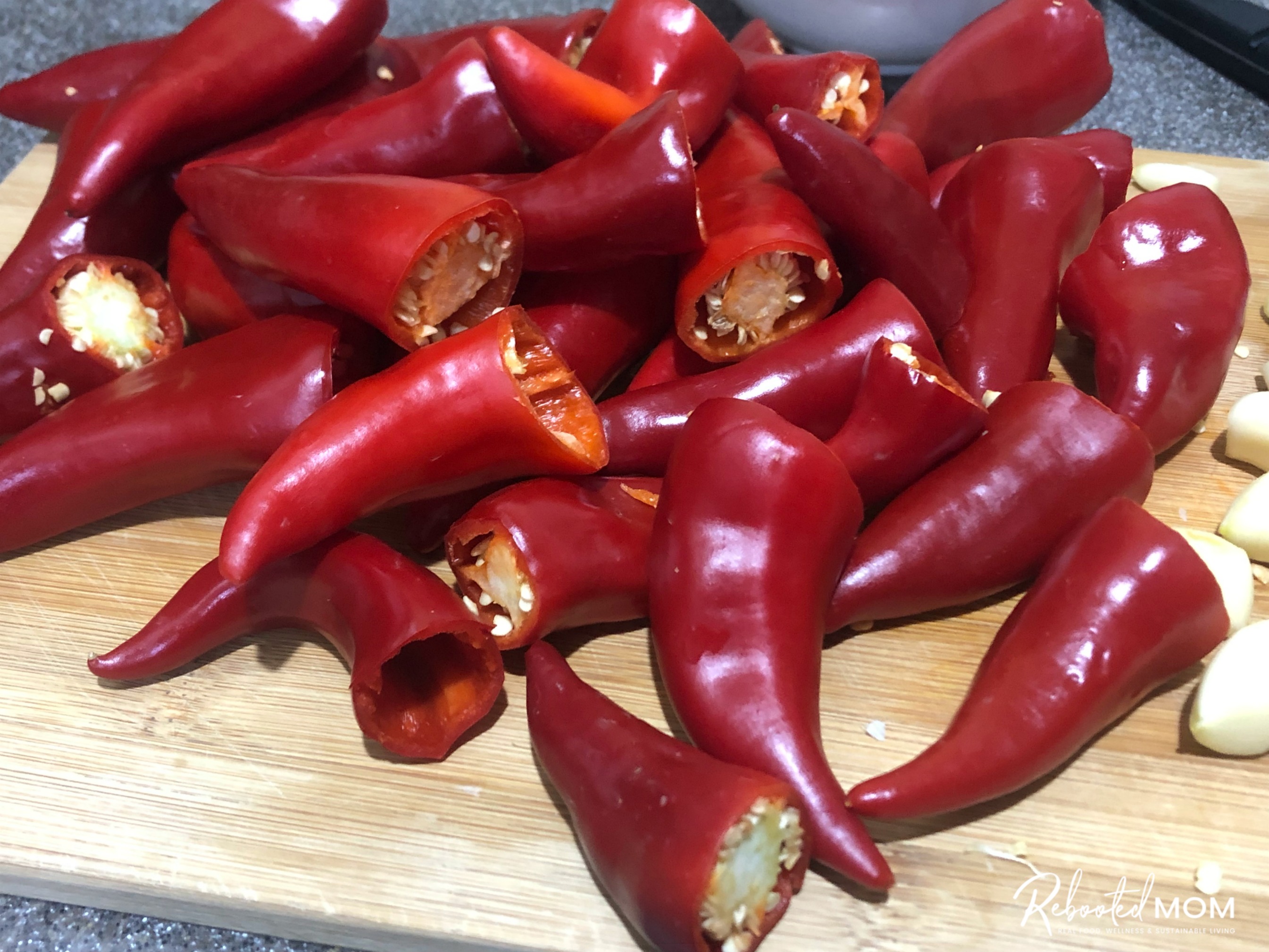 Fresno Chile peppers on a cutting board