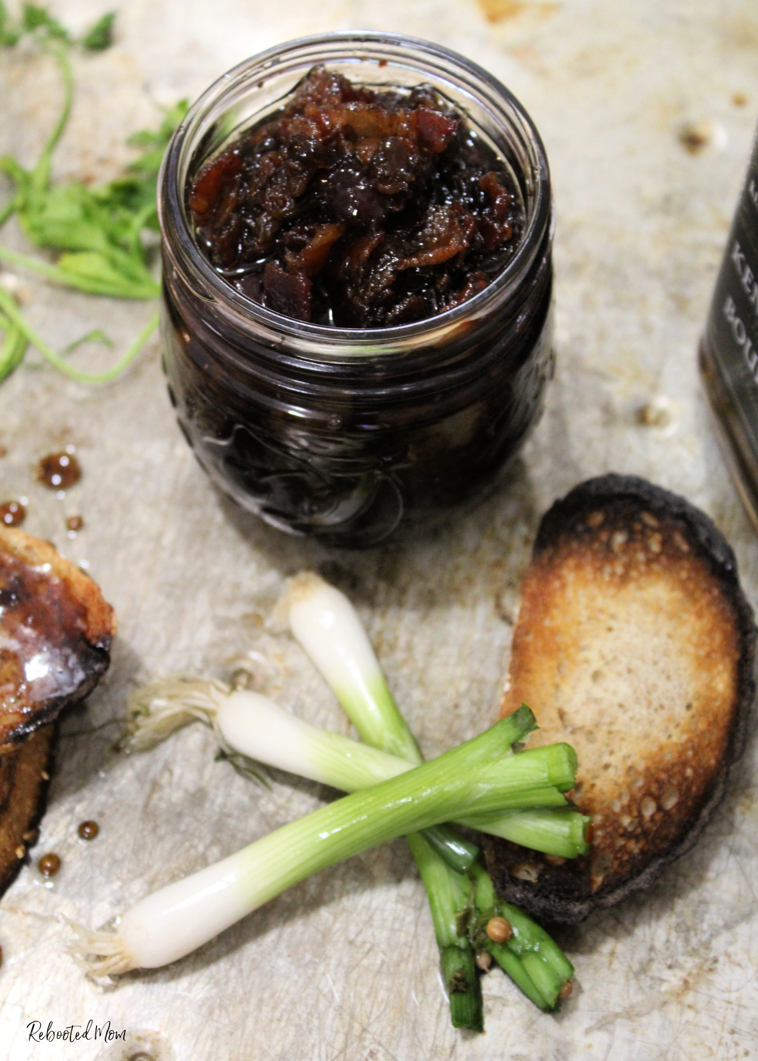 Bourbon Bacon Jam brings together both bourbon and bacon in a jam that's highly addictive and absolutely delicious!