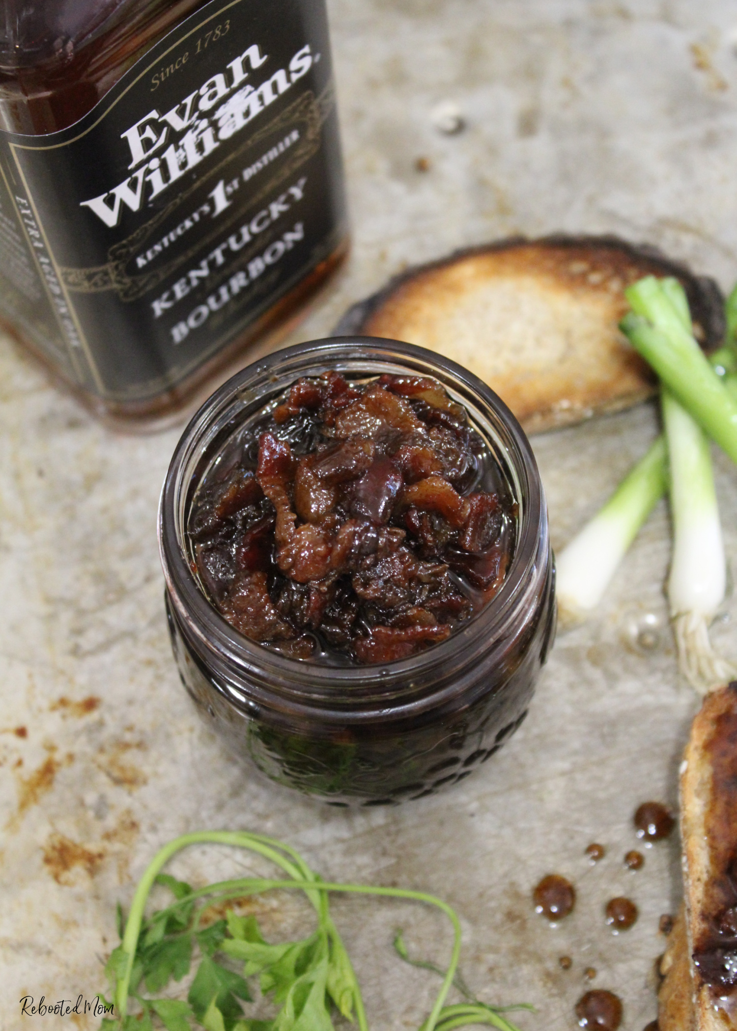 Bourbon Bacon Jam brings together both bourbon and bacon in a jam that's highly addictive and absolutely delicious!