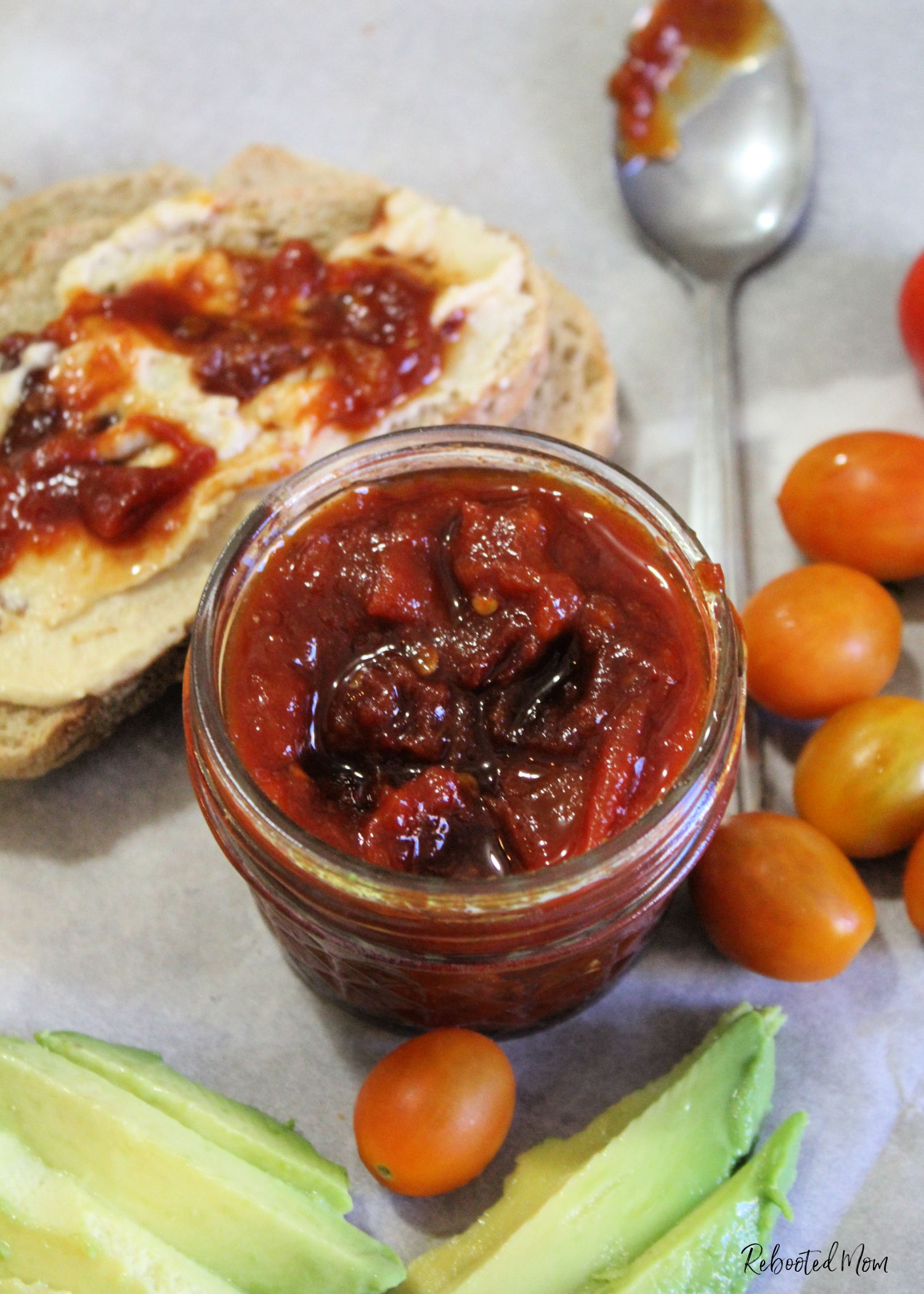 This Chipotle Tomato Jam combines the smoky flavor of chipotle chiles with garden fresh tomatoes for a jam that's unique and flavorful and perfect on toasted sourdough!