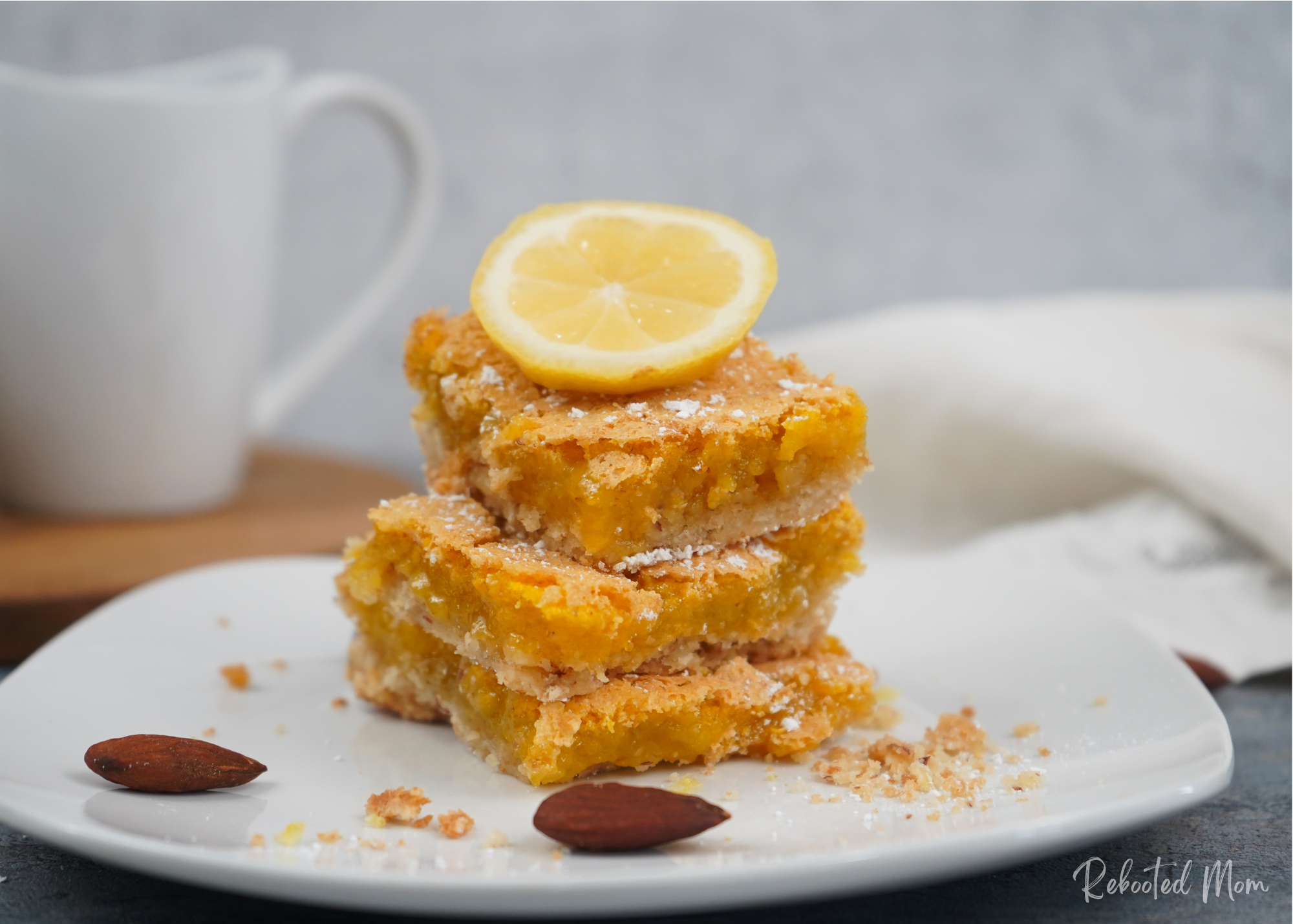 Dreamy Lemon Almond Bars that combine lemon zest with almonds for a delicious bar that's perfect for a spring and summertime dessert!