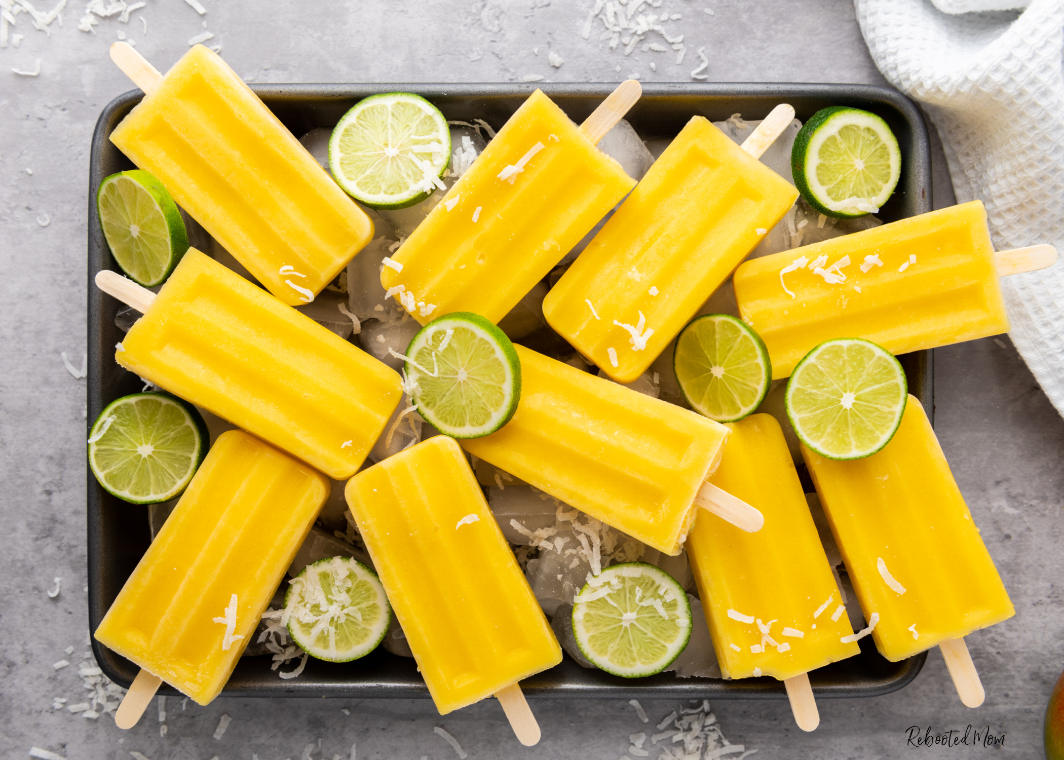Mango Coconut Lime Popsicles that come together in mere minutes with four simple ingredients to make a treat that's absolutely out of this world delicious!