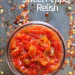 This delicious homemade sweet chili pepper relish is sweet with heat - great for any charcuterie board, burger, or brat.  It's the best way to use a garden bounty of peppers!