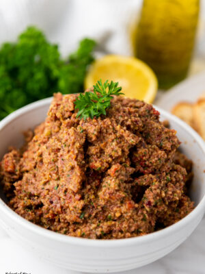 Olive Tapenade is a wonderful olive spread that is easy to make at home. Learn how to make this bold, zippy, delicious spread easily at home! #olive #tapenade #spread #condiment #appetizer