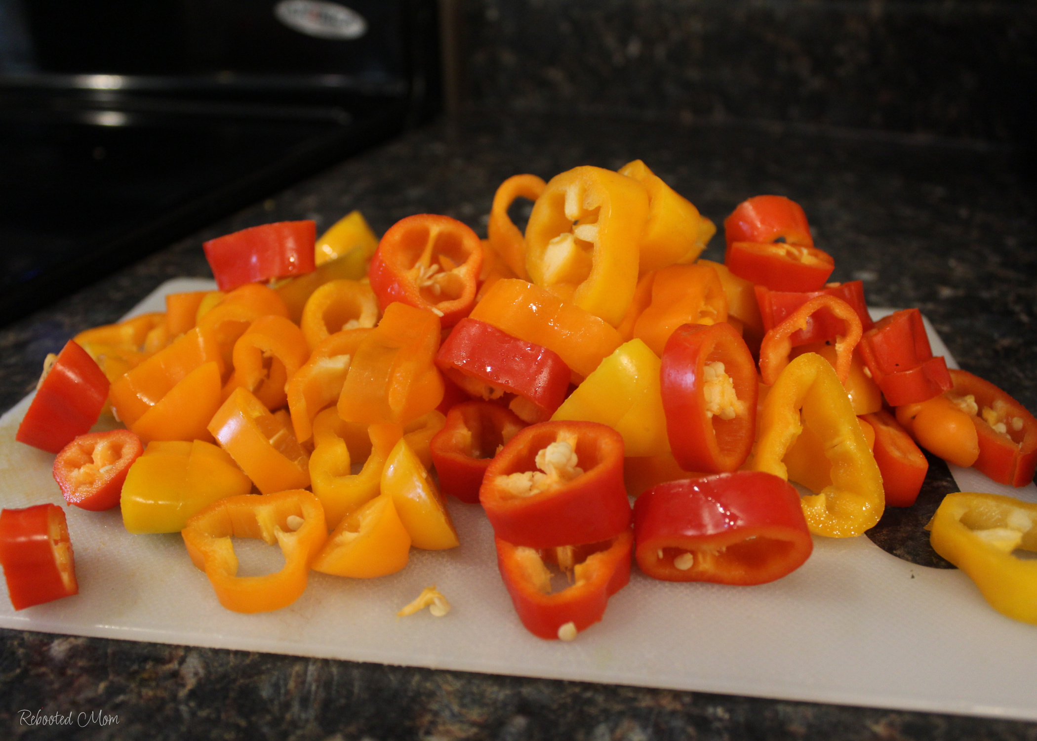 Sweet and Spicy Pickled Mini Peppers are an absolute treasure! A little spicy, and a little sweet, they are the perfect condiment or side to your sandwich or eaten straight from the jar!